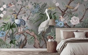 Le papier peint panoramique ARDEA est un rêve de nature. Des arbres, des plantes, des fleurs, des oiseaux s’affichent sur le décor mural dans un joyeux bazar. Certains éléments sont représentés en transparence pour donner de la profondeur à la tapisserie.