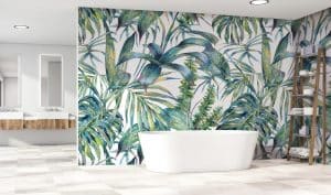 Le papier peint panoramique « NATURALIS » est un décor exotique, composé de feuilles de palmiers et de plantes tropicales qui se croisent dans un désordre charmant. Leurs couleurs sont constituées de dégradés de bleu, jaune et vert.
